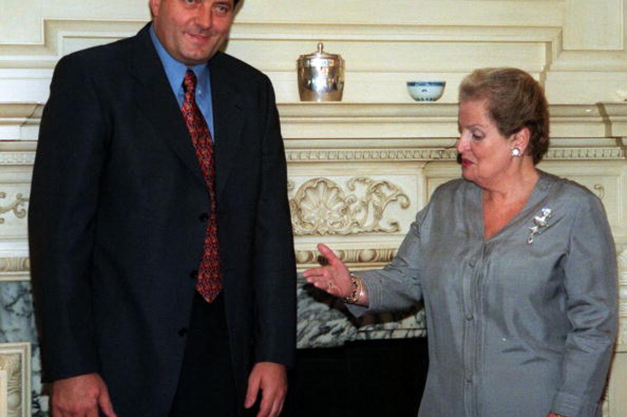 WASHINGTON, :  US Secretary of State Madeleine Albright (R) meets with Prime Minister Milorad Dodik of the Republika Srpska before their bilateral meetings 30 September, 1999, at the US State Department in Washington, DC.      AFP PHOTO/Mario TAMA (Photo 