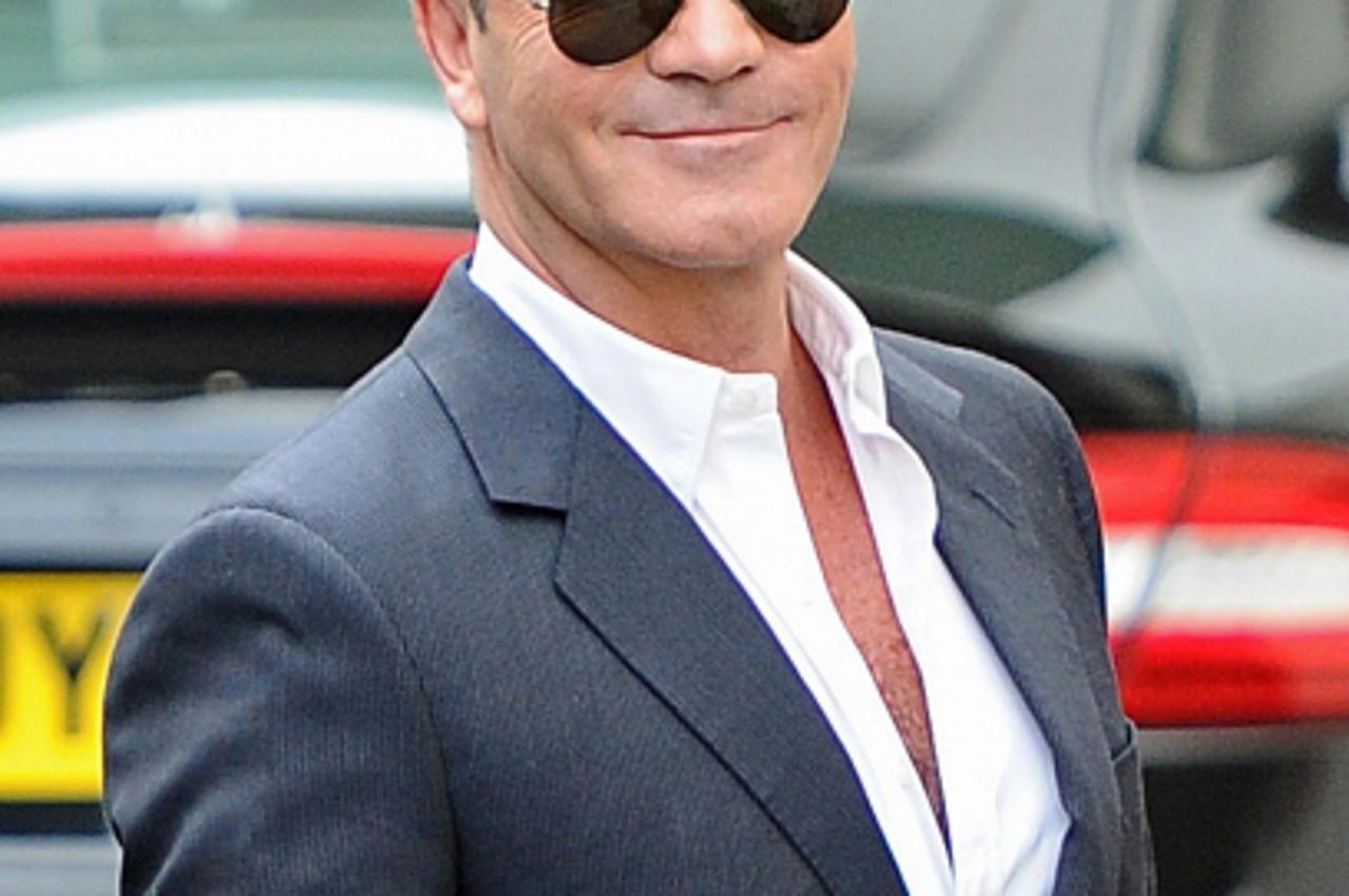 'WORLD RIGHTS  Judges and guests are spotted at the Britain's Got Talent rehearsal studio in London, UK. 01/06/2011  Pictured: Simon Cowell   BYLINE DAVID BOYES/BIGPICTURESPHOTO.COM:   REF:001/DSB  U