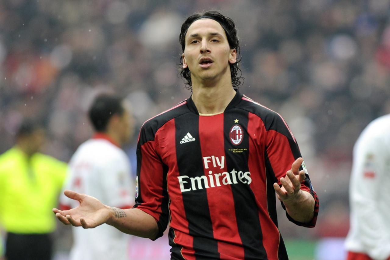 \'AC Milan\'s Swedish forward Zlatan Ibrahimovic reacts against Bari during their Italian Serie A football match on March 13, 2011 in San Siro stadium in Milan . AFP PHOTO / OLIVIER MORIN\'