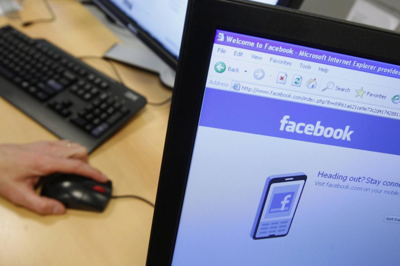 \'A Facebook page is displayed on a computer screen in Brussels April 21, 2010. Over the past six years, social networking has been the Internet\'s stand-out phenomenon, linking up more than one billi