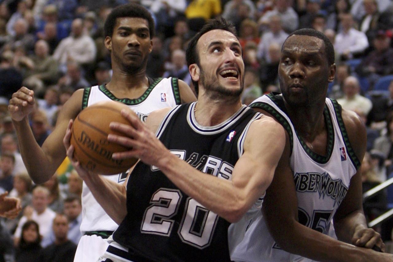 'San Antonio Spurs guard Manu Ginobili (20) drives for a layup against Minnesota Timberwolves forwards Al Jefferson (25) and Corey Brewer (L) during the second half of their NBA basketball game in the