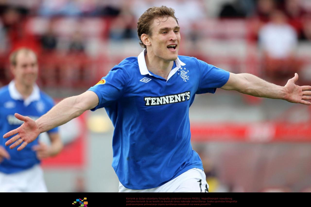 \'Ranger\'s Nikica Jelavic celebrates scoring during the Clydesdale bank Scottish Premier League match at New Douglas Park, Hamilton. Photo: Press Association/Pixsell\'