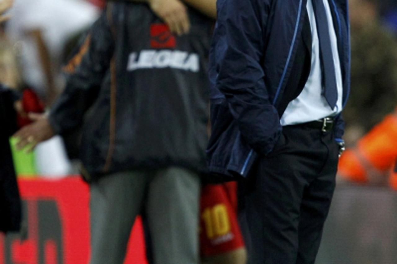 \'England\'s manager Fabio Capello reacts after their Euro 2012 qualifying soccer match against Montenegro at Wembley Stadium in London, October 12, 2010.      REUTERS/Darren Staples (BRITAIN  - Tags: