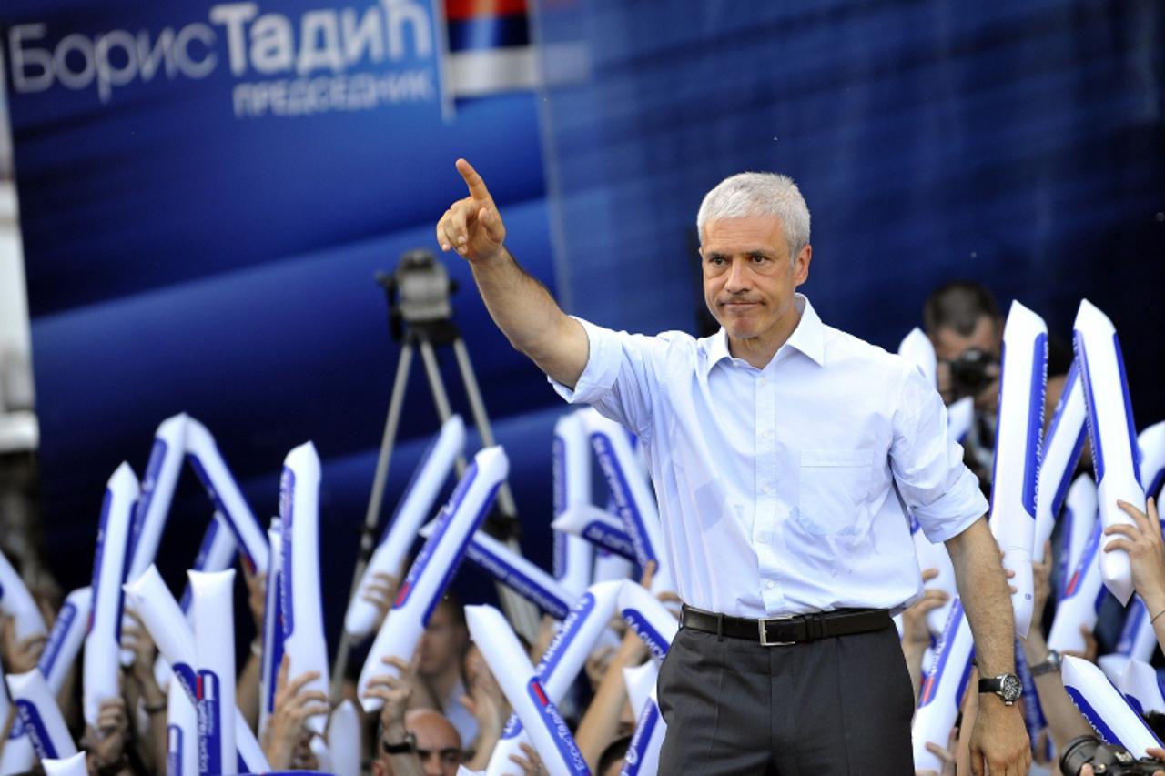 'Serbia\'s incumbent President Boris Tadic gestures in front of supporters of the Democratic Party, during a rally in Belgrade, on May 2, 2012. Serbia\'s incumbent President Boris Tadic brought Serbia