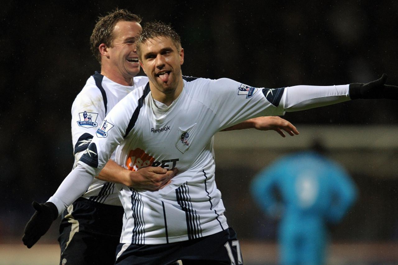 \'(FILES) A file photo taken on December 29, 2009, shows Bolton Wanderers\' Croatian forward Ivan Klasnic (R) celebrating with team-mate Kevin Davies after he scored during their English Premier Leagu