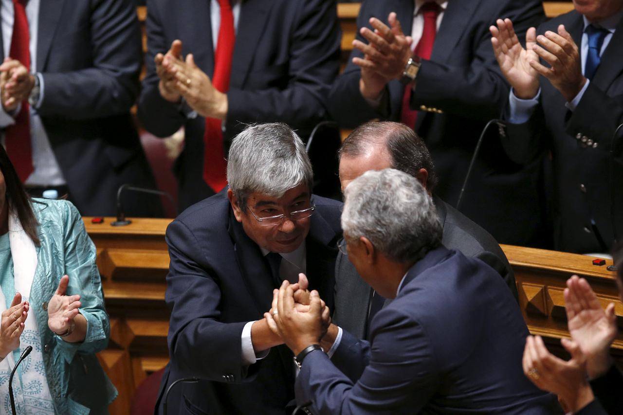 Eduardo Ferro Rodrigues (L) of Socialist Party is congratulated by his leader Antonio Costa (R), after his election as Portuguese Parliament President in Lisbon, Portugal, October 23, 2015. Portugal's opposition Socialists pledged on Friday to topple the 