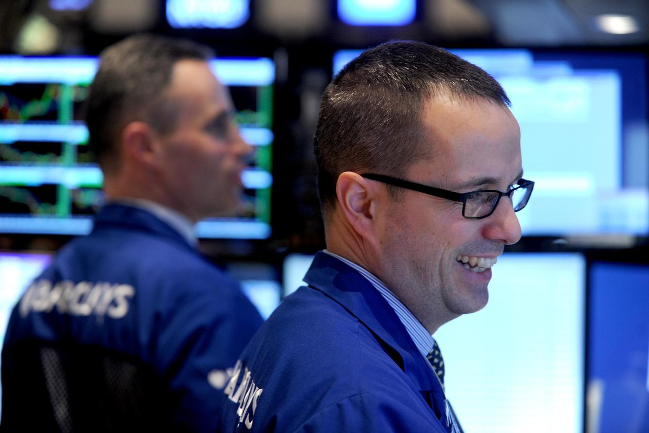 The NYSE Closing Bell Stock Market - New YorkA trader works on the floor of the New York Stock Exchange at the closing bell on January 13, 2014. Wall Street stocks finished little changed following another rocky trading session, as the market weighed bett