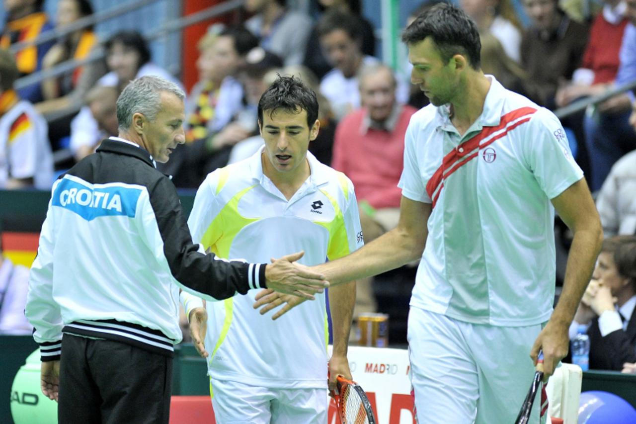 \'05.03.2011., Zagreb - Dom sportova, prvo kolo ITF Davis cupa, Hrvatska - Njemacka. Utakmica parova, Ivan Dodig, Ivo Karlovic - Christpher Kas, Philipp Petzschner. Goran Prpic Photo: Marko Lukunic/PI