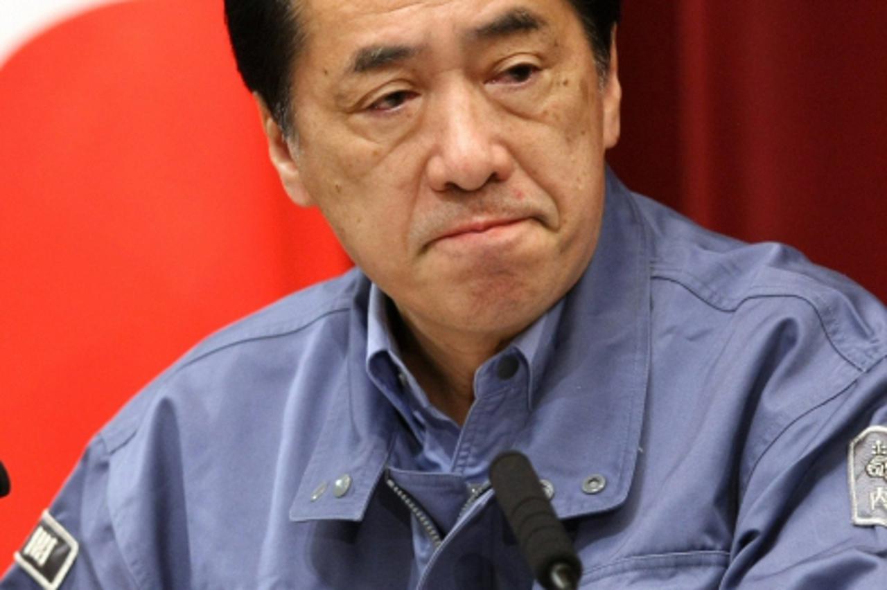 \'Japanese Prime Minister Naoto Kan speaks at an press conference where he outlined the risk of large-scale power outages and the need to save energy after a massive earthquake shut down some atomic p