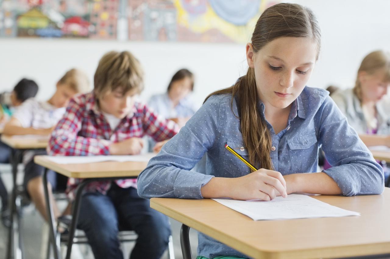 Students taking a test in classroom