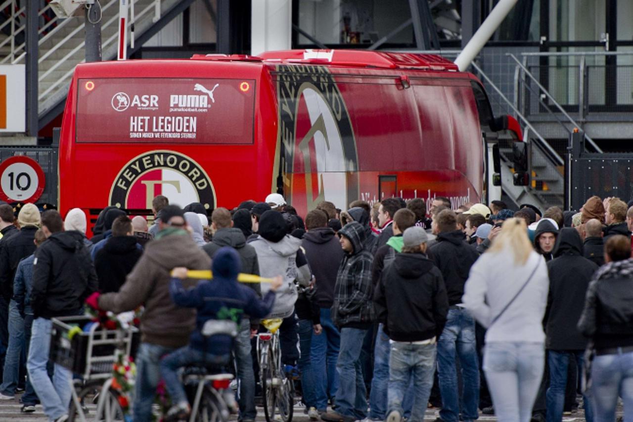 \'A bus carrying Feyenoord players awaited by angry fans, returns to De Kuip stadium in Rotterdam, on October 24, 2010. PSV inflicted a 10-0 drubbing on Feyenoord in the Dutch league on October 24, th