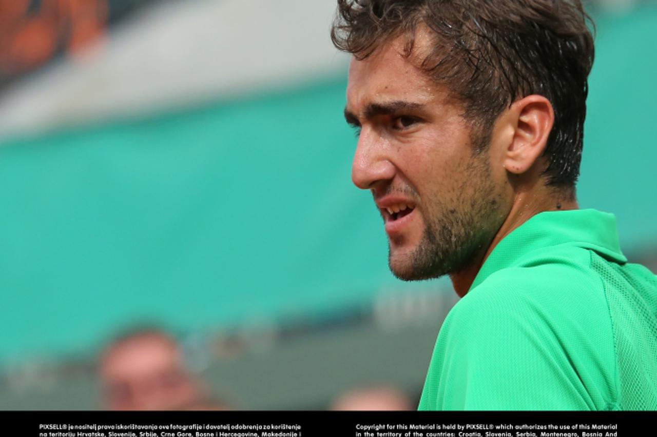 'WORLD RIGHTS NO USA, FRANCE, AUSTRALIA.   Croatian Marin Cilic hits a shot during his French Open mens third round match against Juan Martin Del Potro of Argentina. Del Potro defeated Cilic 6-3, 7-6 