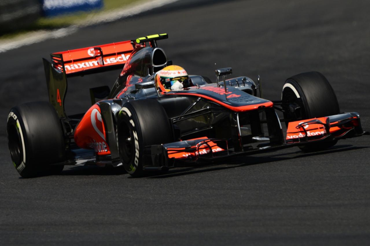 'McLaren Mercedes\' British driver Lewis Hamilton drives at the Hungaroring circuit on July 28, 2012 in Budapest during the third practice session ahead of the Formula One Hungarian Grand Prix.  AFP P