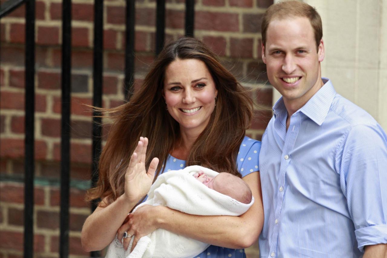 'Britain's Prince William and his wife Catherine, Duchess of Cambridge appear with their baby son, outside the Lindo Wing of St Mary's Hospital, in central London July 23, 2013. Prince William and h
