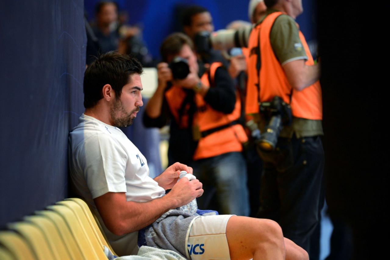 'Montpellier\'s French player Nikola Karabatic looks on prior to the French D1 handball match Paris Saint-Germain vs Montpellier on September 30, 2012 at Pierre de Coubertin Arena in Paris. Paris won 