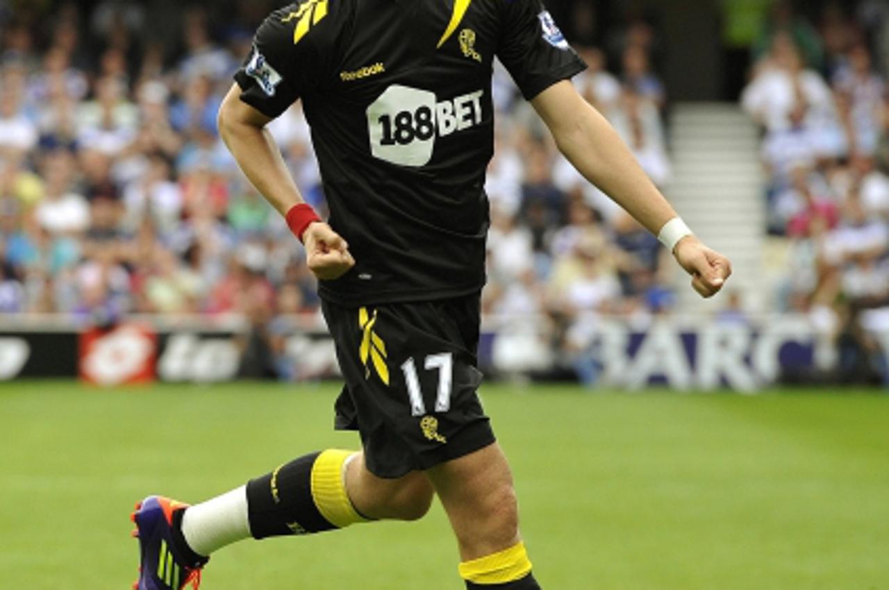 \'Bolton Wanderers\' Ivan Klasnic celebrates after scoring against Queens Park Rangers during their English Premier League soccer match at Loftus Road in London August 13, 2011.   REUTERS/Dylan Martin