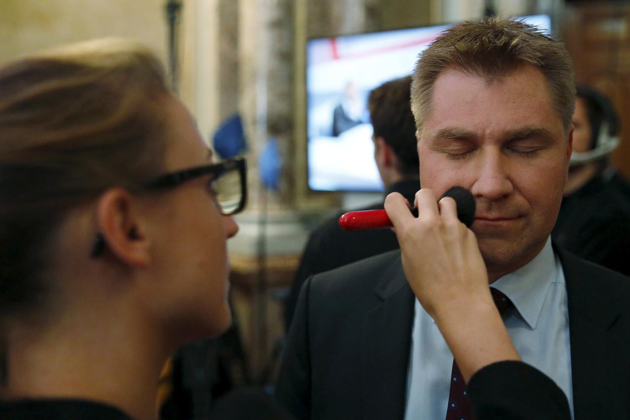 Swiss People's Party (SVP) President Toni Brunner has make-up applied before a TV debate in the Swiss Parliament building in Bern, Switzerland October 18, 2015. The anti-immigration Swiss People's Party (SVP) won the biggest share of the vote in Sunday's