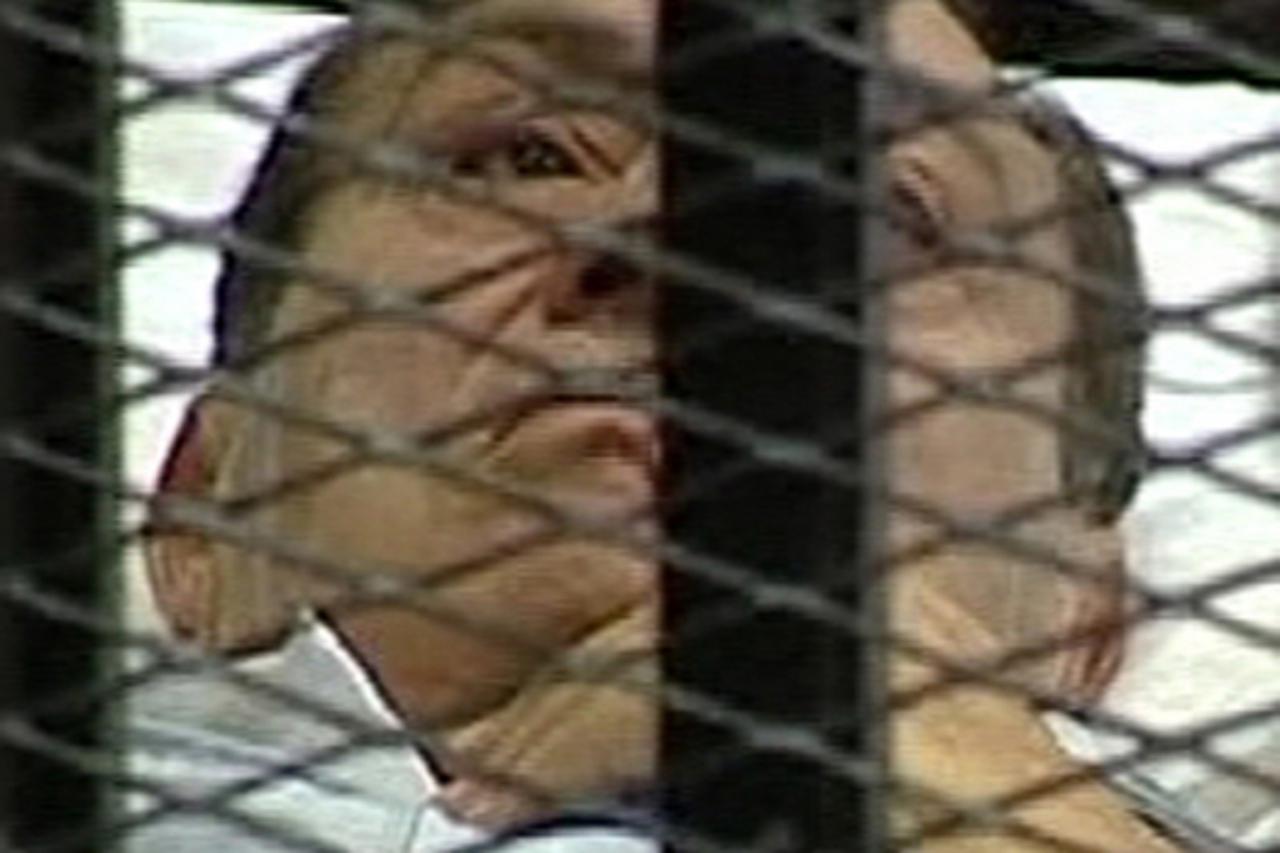 'Former Egyptian President Hosni Mubarak is seen in the courtroom for his trial at the Police Academy in Cairo in this still image taken from video August 3, 2011. Egypt\'s Hosni Mubarak was shown whe