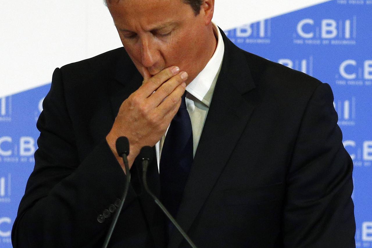 Britain's Prime Minister David Cameron gestures as he delivers a speech to business people at the CBI dinner in Glasgow, Scotland August 28, 2014. Scotland will hold a referendum on independence on September 18. REUTERS/Russell Cheyne (BRITAIN - Tags: POL