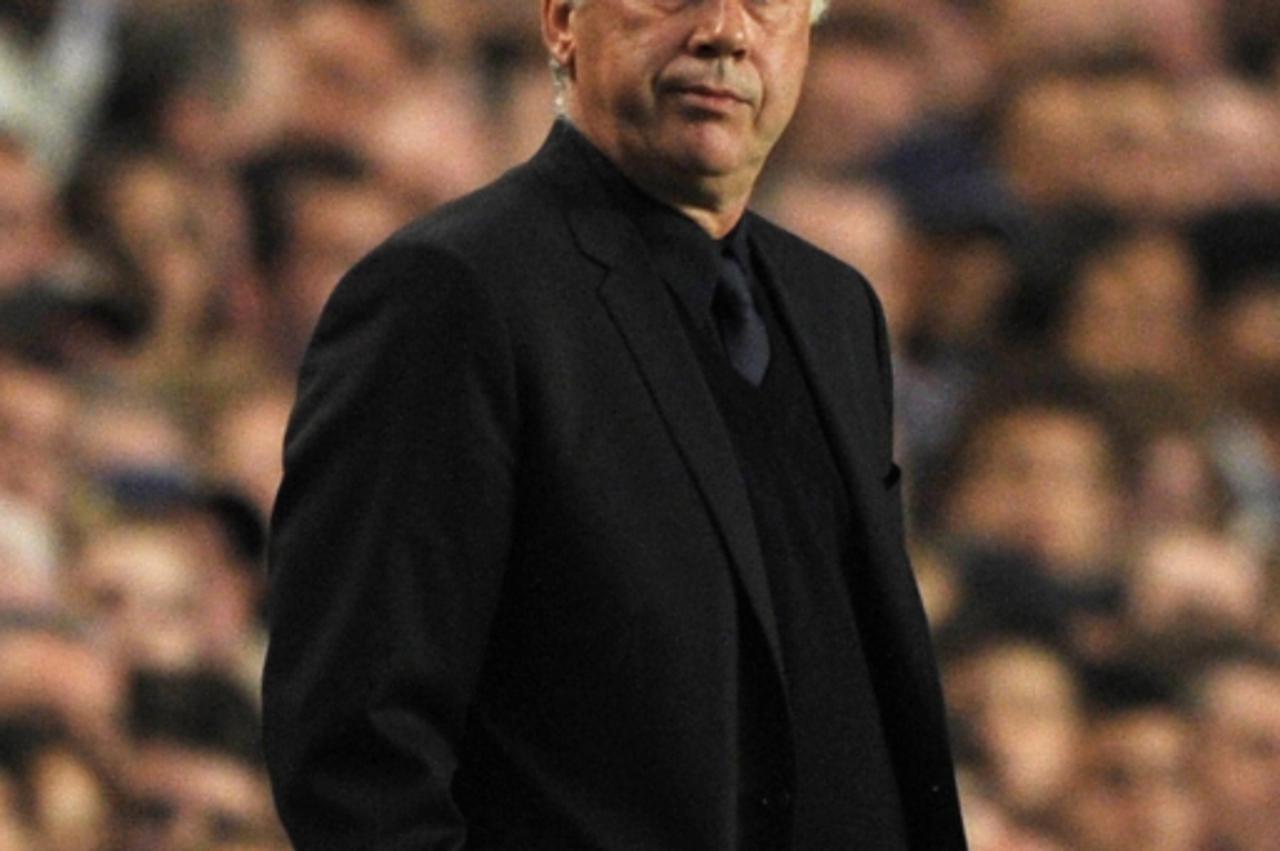 \'Chelsea\'s manager Carlo Ancelotti reacts during the first leg of their Champions League quarter final soccer match against Chelsea at Stamford Bridge in London April 6, 2011. REUTERS/Dylan Martinez