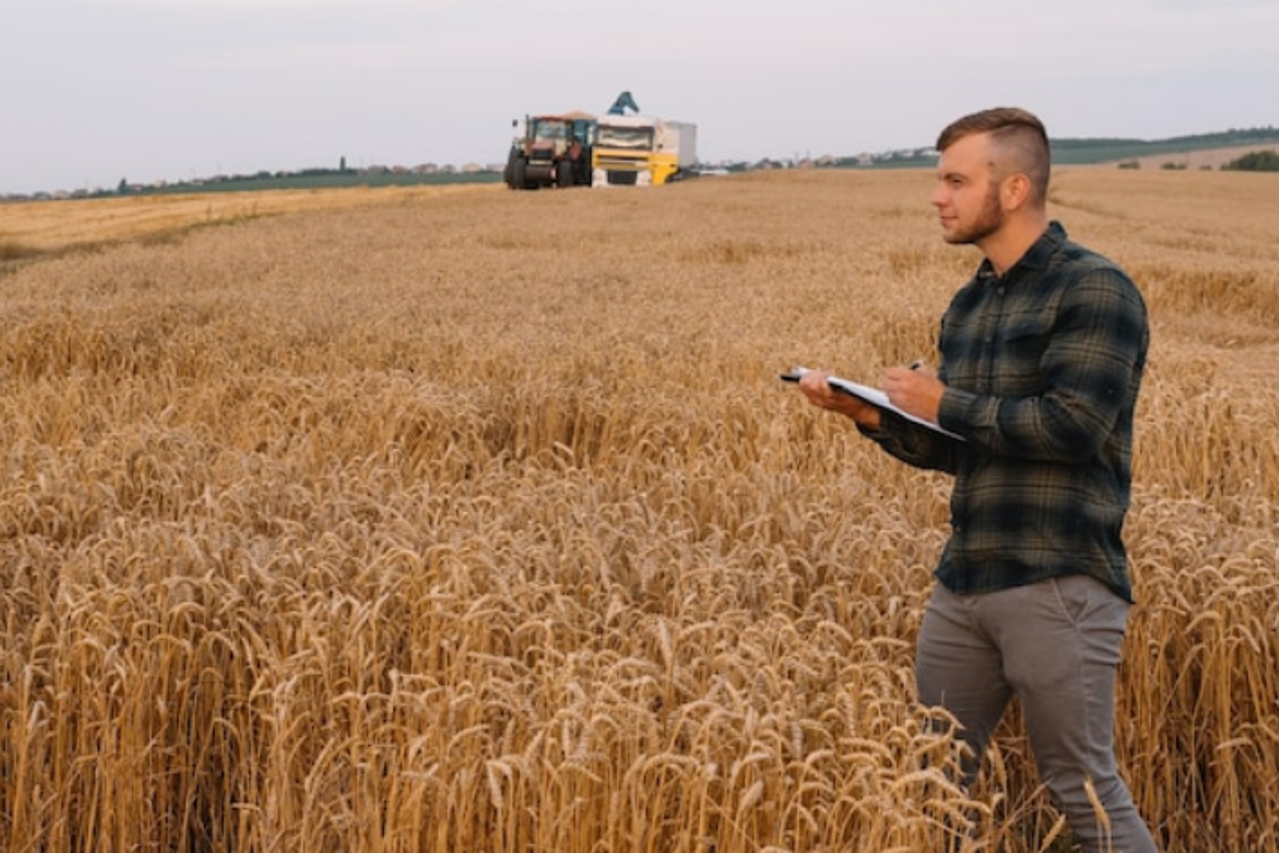 storyeditor/2022-12-12/Screenshot_2022-12-12_at_12-41-10_young-attractive-farmer-with-laptop-standing-wheat-field-with-combine-harvester-background_255667-18735_jpg__JPEG_Image_626_x_418_pixels_.png