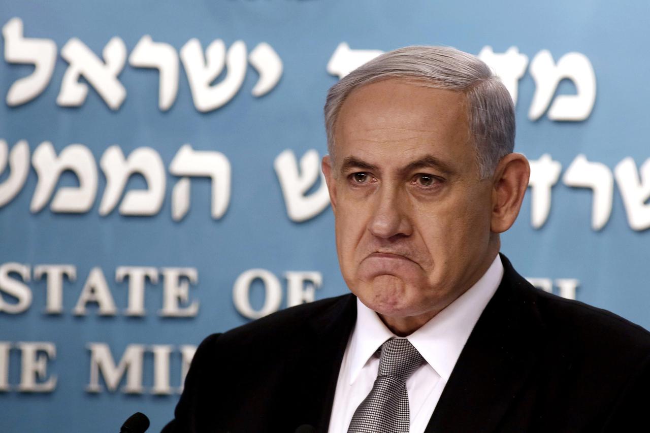 Israel's Prime Minister Benjamin Netanyahu is pictured during a news conference at his office in Jerusalem December 2, 2014. Prime Minister Benjamin Netanyahu sacked his finance and justice ministers on Tuesday, signalling the break up of his bickering co